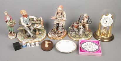 A collection of Capodimonte ceramic figures to along with assorted collectables to include Robert