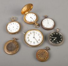 Seven assorted pocket watch and travel clock movements to include full hunter cased examples. All in