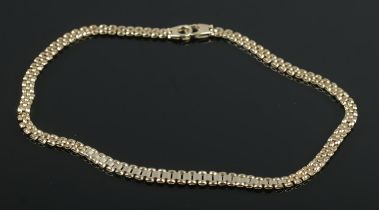 A 9ct gold 16 inch graduated flat link necklace. 18.93g.