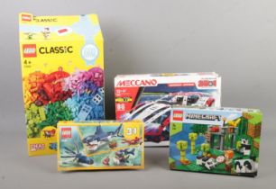 A collection of Lego and Meccano, including Lego Classic, Meccano Supercar 25 in 1 and Lego