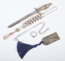 A collection of silver and silver mounted items, to include letter opener topped with Scottish war