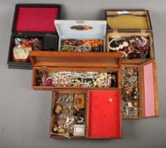 A large quantity of costume jewellery. Includes beads, brooches, rings, necklaces, etc.