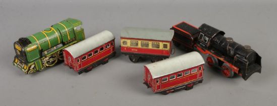 A small quantity of OO gauge tin plate model railway trains. Karl Bub including locomotive and