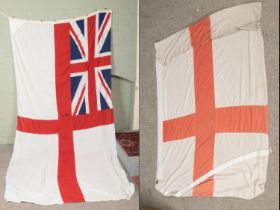 Two large British flags, to include 1983 dated Zephyr White Ensign example, along with St George's