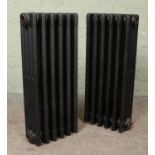 Two painted six-bar cast iron radiators. Height: 75cm.