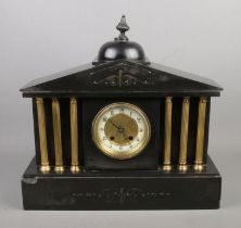 A large Victorian slate and brass mantel clock