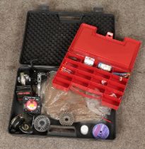 A case of mostly fishing equipment. Includes KP Morritts's Intrepid Supreme and Surfcast reels,