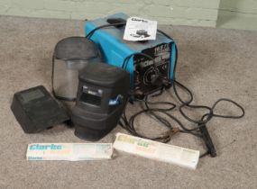A Clarke Weld 165 TE Turbo welder with masks and welding electrodes. Powers up but not tested.