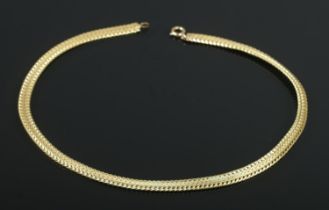 A 9ct gold 16 inch flat link necklace. 19.94g.