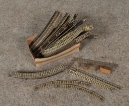 A box of Hornby Dublo OO Gauge tin plate model railway track.
