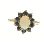 OPPULENT OPAL! A 375 hallmarked yellow gold opal and blue stone ring, size M, gross weight 1.75g