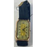 A 375 hallmarked rectangular gilded faced Swiss made 15 jewel movement watch with fabric strap