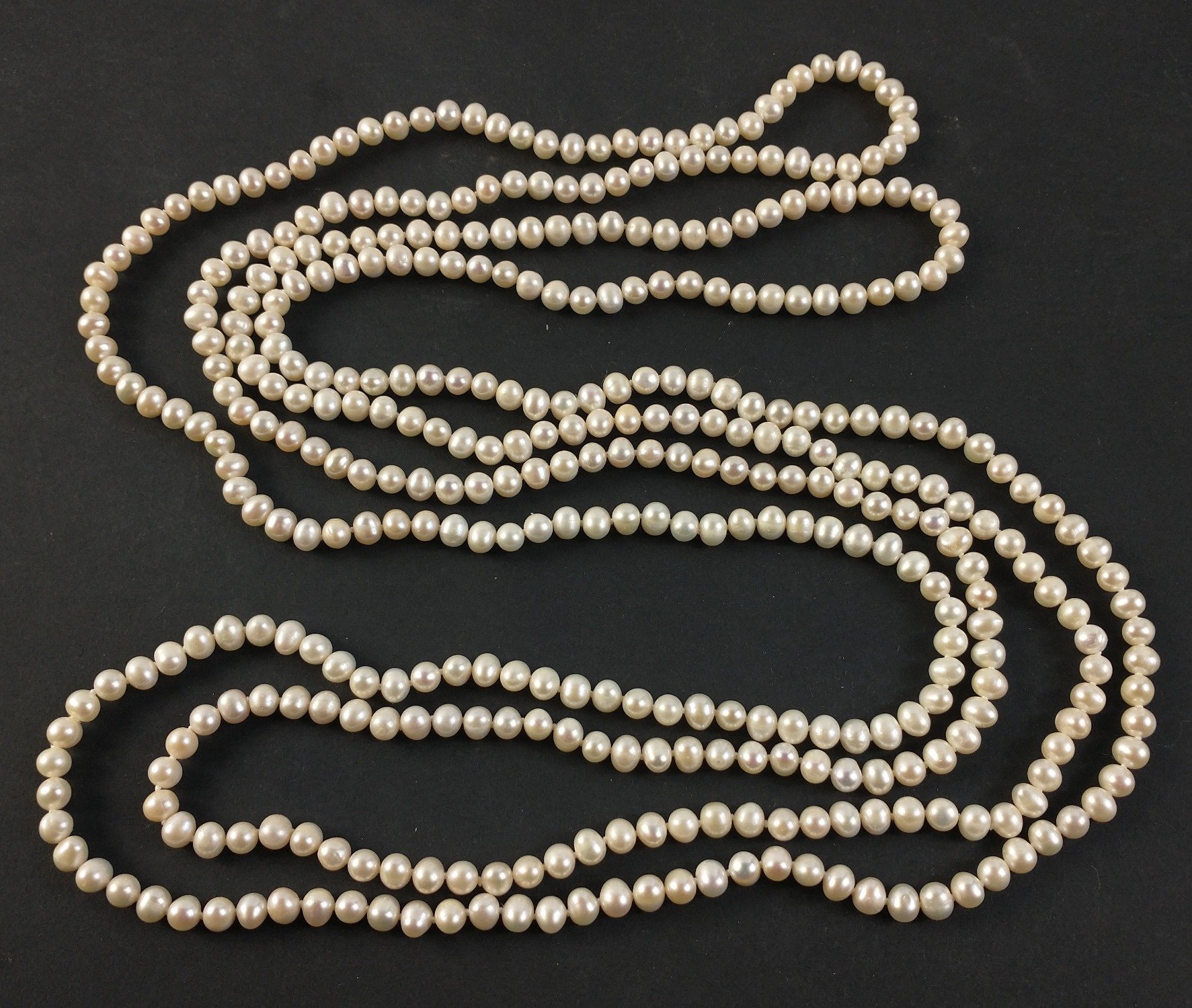 A string of fresh water pearls approx 250cm long