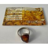 A 925 Silver marked Estonian Baltic Amber ring with certificate card