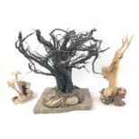 Three unusual pieces of treen to include a tree with mushrooms growing from it 15cm tall, a carved