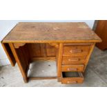 CUTE! A circa 1930/40's light oak kneehole desk with 4 drawers and a pull-out section and an