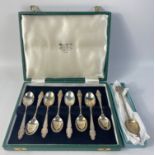 A boxed silver spoon from Inverness, hallmarked Birmingham 1925 plus a set of 8 coffee spoons