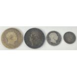 A small lot of four early silver coins of interest to include a rather pleasing toned George IV