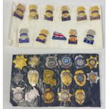 A collection of United States police departments pins including a North Carolina Highway Patrol