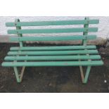 Green painted child's slatted wooden bench