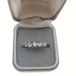 An 18ct stamped 5 stone diamond ring size L, gross weight 2.84g