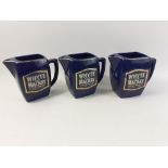 Three WHYTE & MACKAY square shaped water jugs