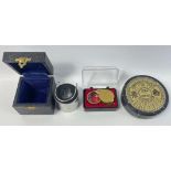 A handy boxed portable map/reading magnifier, a boxed gold coloured jeweller's loupe and a 40 year