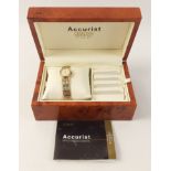 A ladies 9ct gold hallmarked Birmingham ACCURIST 4 bar bracelet watch