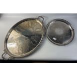 A large twin handled oval white metal serving tray 56cm long x 44cm wide approx with decoration of