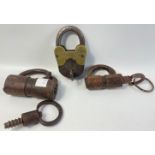 Two antique padlocks with keys, plus a slightly more modern one, also with key