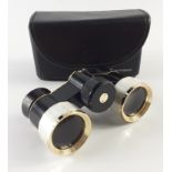 A pair of BRASSER 3x27 black and pearl finish opera binoculars with carry case