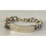 A chunky SILVER ID bracelet and chain
