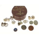 A horseshoe shaped stud box containing assorted VINTAGE shirt studs etc