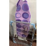 An ironing board with cover and a PUKAH folding clothes airer as in new condition