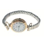 A REID ladies watch with expanding bracelet stamped 9ct 375, hallmarked Birmingham, face measures