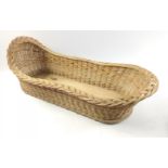 A child's wicker Moses basket 60x28cm approx
