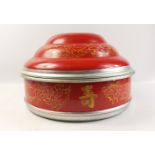 A VERY LARGE CHINESE red-painted round aluminium food storage container with lid - dimensions 40cm