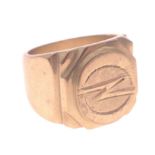 A chunky signet ring, stamped 18K and 750, size V weight 23.2g approx