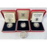 Four ROYAL MINT United Kingdom silver proof Piedfort one pound coins, three in boxes, 2 with