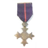 A post WWI 1st Type Military OBE Medal with ribbon