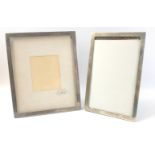 Two silver photo frames hallmarked Birmingham 1931 with wooden back 27x22cm and 26x17cm approx by