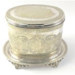 A versatile oval white metal lidded box - tea caddy, tobacco jar or biscuit barrel, on its own