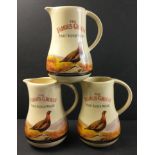 Three FAMOUS GROUSE water jugs each 18cm high by Castle Ceramics, no damage