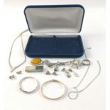 Small box containing 2 pairs of gold earrings, silver and white metal goods to include brooches, 2
