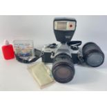 A PENTAX MG SLR camera with 2 Tokina lenses and a Pentax AF160 flash