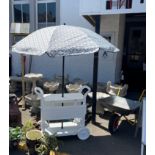 HERE COMES THE SUMMER!A brand new patterned garden parasol - can adjust height etc - this does