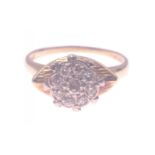 DAZZLING DIAMONDS! 18ct stamped dress ring with eight diamonds and a larger centred diamond all in