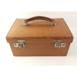 A vintage monogrammed HARRODS tan leather hard-sided travel case 30x20x14cm