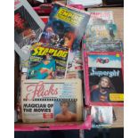 A collection of movie theme magazines Star Logs, Star Trek, Superman, Supergirl, Indiana Jones books