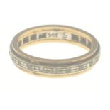 An eternity ring stamped 9ct and JH set with clear stone, size K, gross weight 2.7g approx